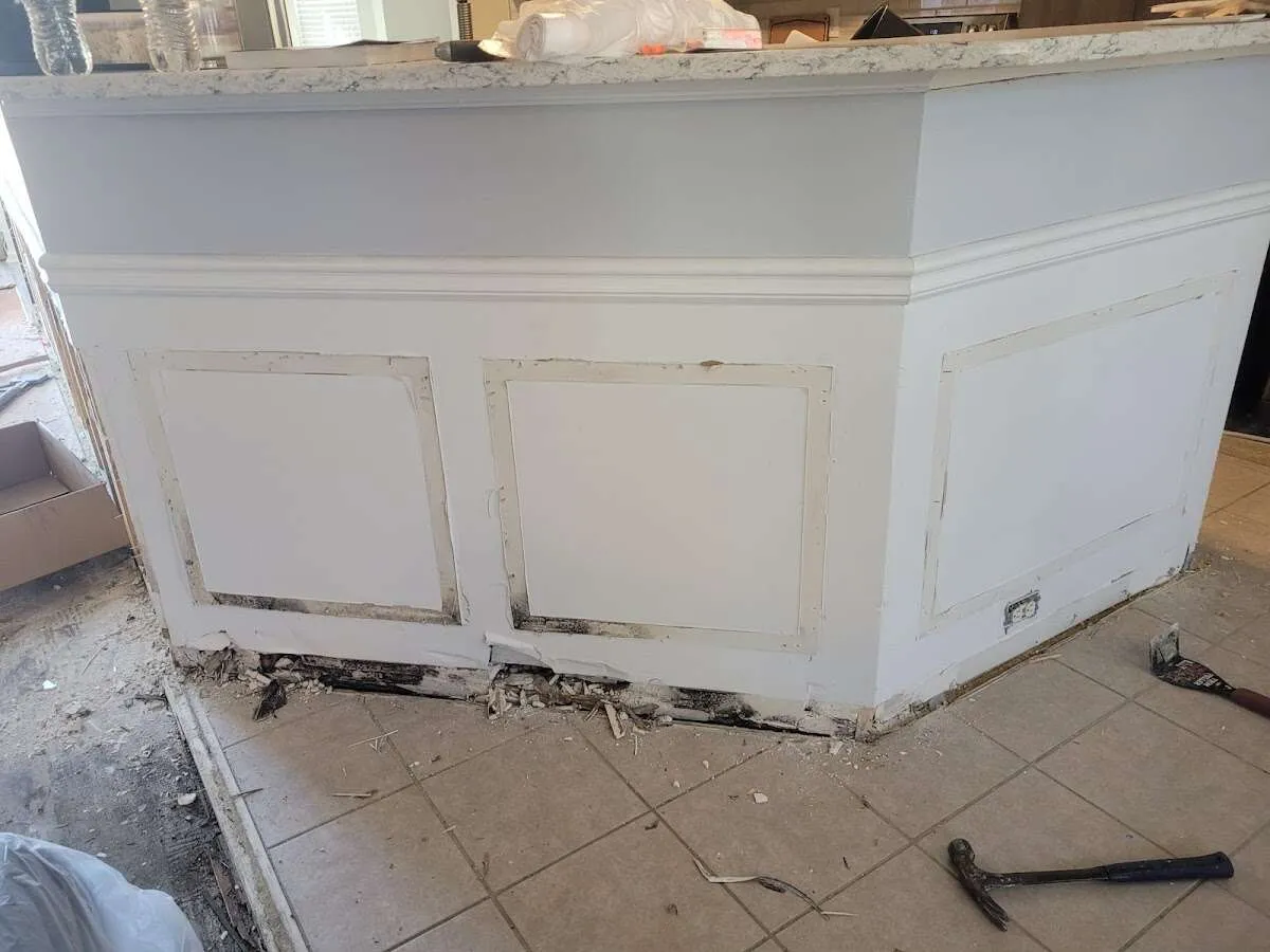 Water damage and mold on kitchen during Storm Damage Restoration in Buckley
